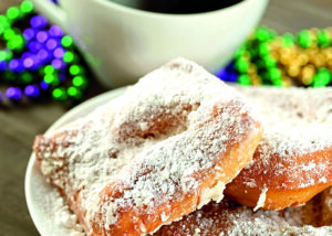 Beignets de Nueva Orleans y café.