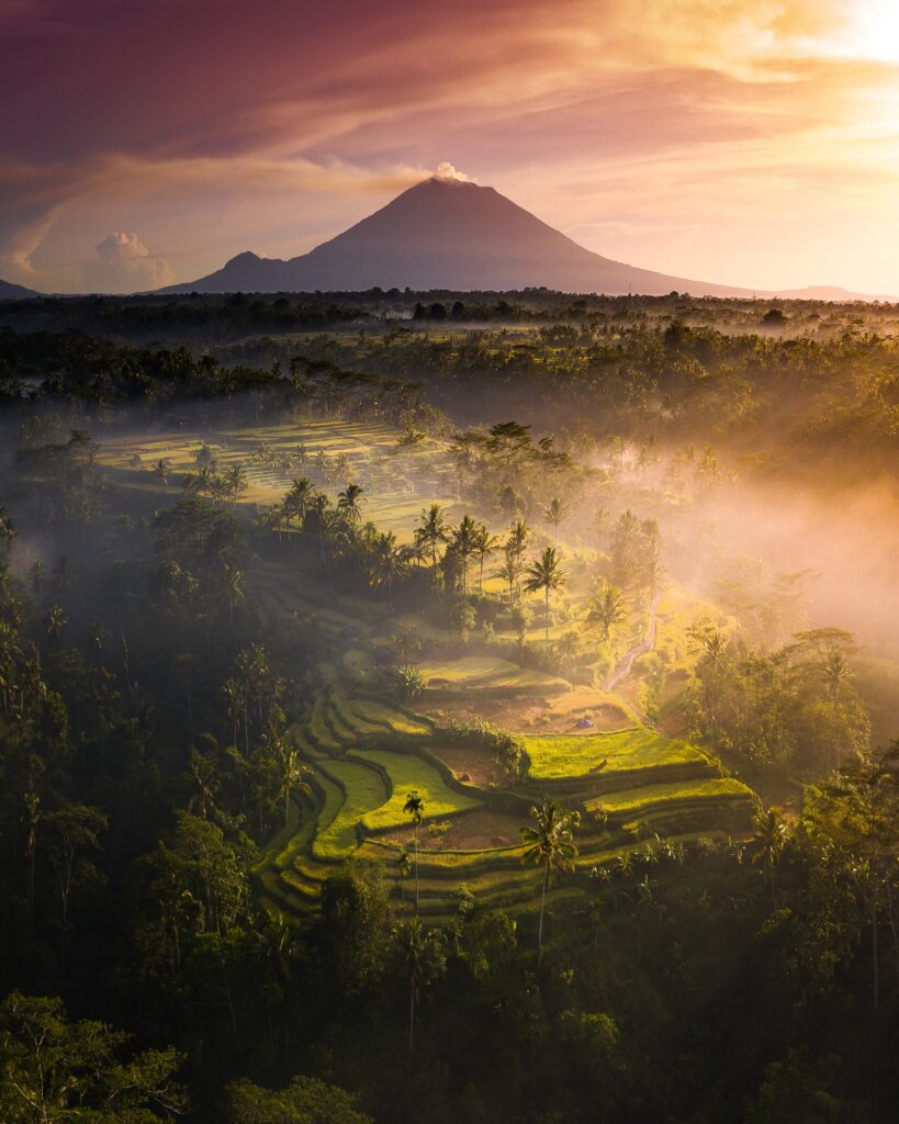 A vertical aerial shot of beautiful landscape near the Mount Agung (Gunung Agung), Indonesia